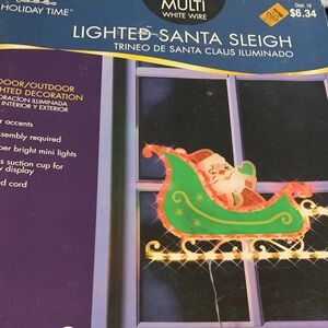 Vintage indoor/outdoor Holiday Time Lighted Santa Sleigh - Red and Green